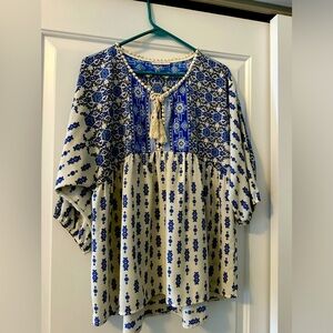 Blue and white blouse with tie detail at neck. Size L